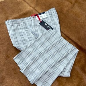Size 36 waist and 32 length brand new Tommy Hilfiger, gray pants